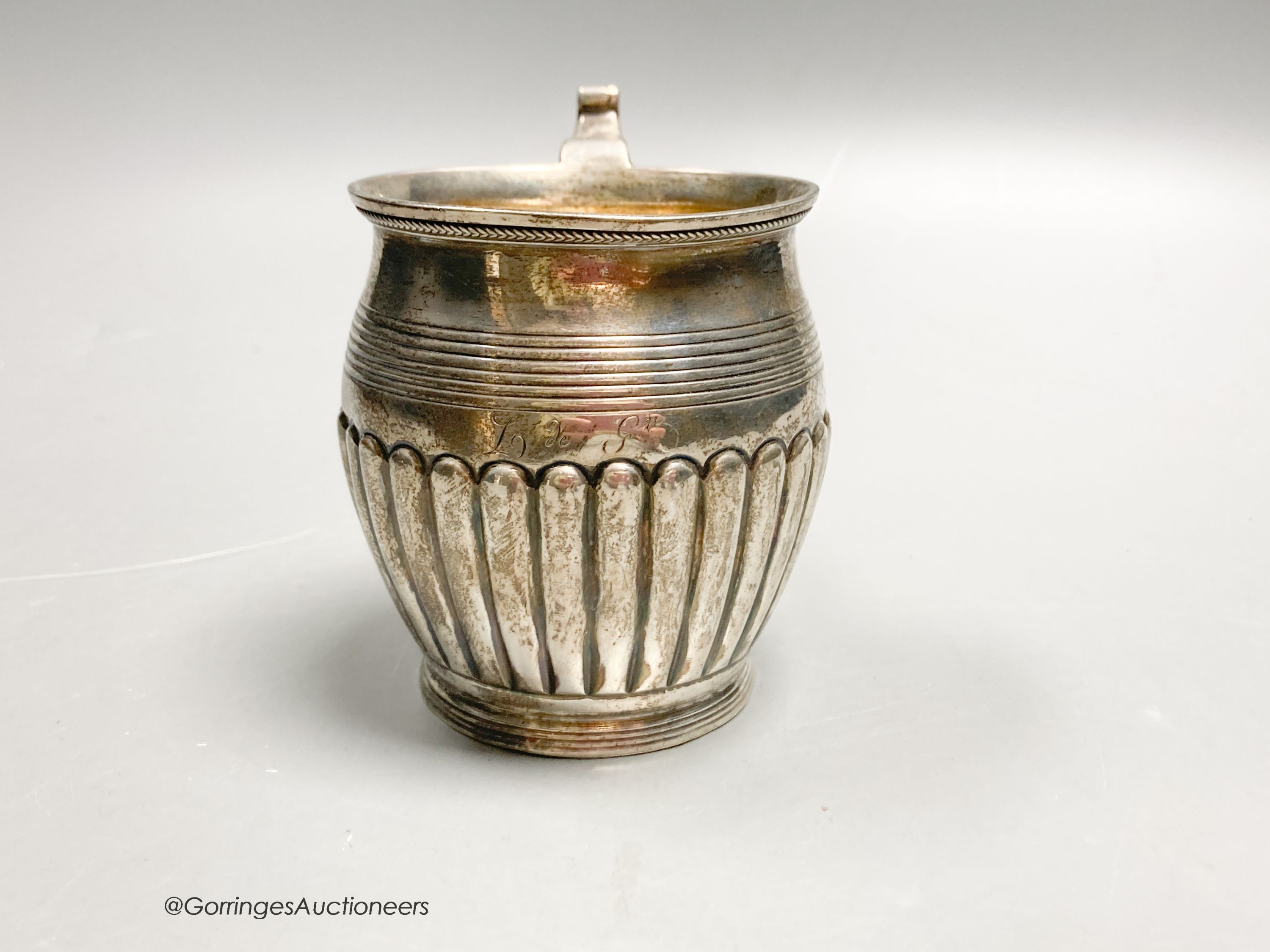 A late George III demi fluted silver christening mug, Crispin Fuller?, London 1818, 85mm, 3.5oz.